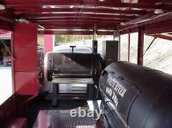 25-Foot BBQ TRAILER WITH CUSTOM SMOKER PLUS TOW BARS, STEREO, FRIDGE AND MORE