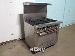 GARLAND COMMERCIAL H. D. NATURAL GAS 6 BURNERS STOVE withOVEN & S. S. SHELF