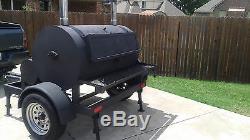 Rotisserie pit smoker