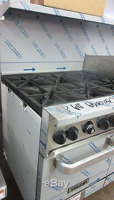 Vulcan LP Gas 6 Burner Range with Raised 24 Griddle & Broiler Double Oven